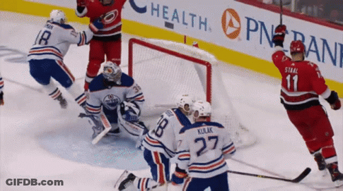 Hockey Game In Front Of PNB Bank Ad GIF