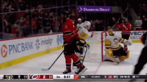 Hockey Game In Front Of PNC Bank GIF