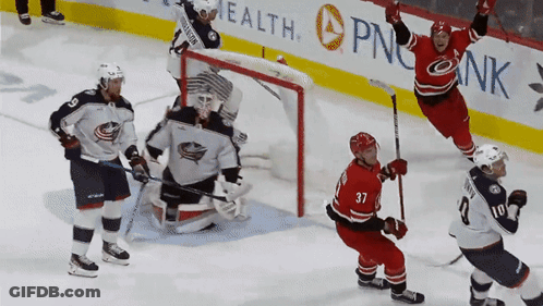Hockey Game In Front Of PNC Bank Ad GIF