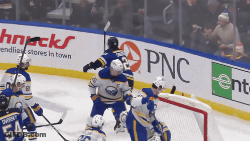 Hockey Game In Front Of PNC Sign GIF