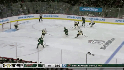 Hockey Game In Front Of Progressive Ad GIF