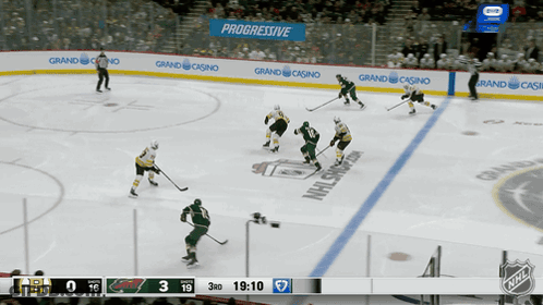 Hockey Game In Front Of Progressive Banner GIF