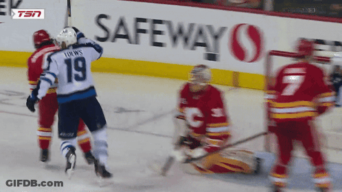 Hockey Game In Front Of Safeway Ad GIF