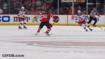 Hockey Game In Front Of Score Bet Sign GIF