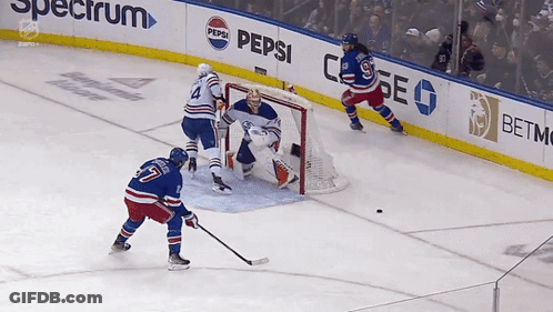 Hockey Game In Front Of Spectrum Ad GIF