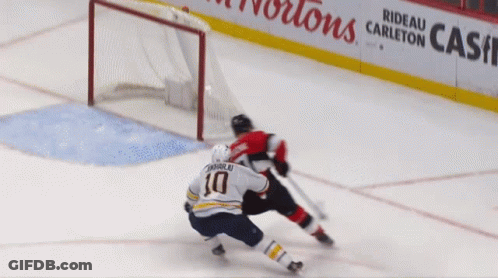 Hockey Game In Front Of Suitex Sign GIF