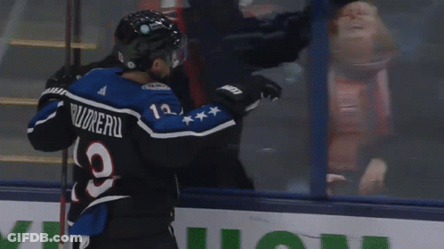 Hockey Game In Front Of Tim Hortons Ad GIF