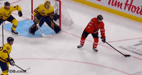 Hockey Game In Front Of Tim Hortons GIF