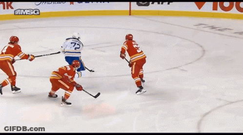 Hockey Game In Front Of Tim Hortons Sign GIF