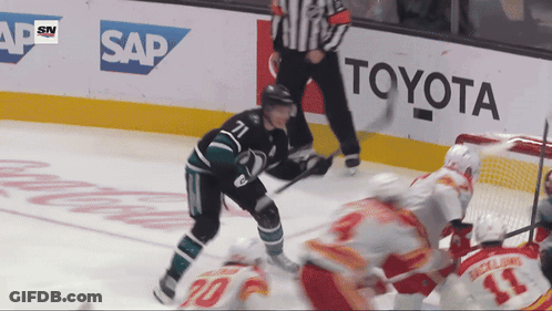 Hockey Game In Front Of Toyota Ad GIF