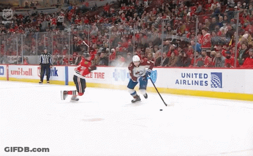Hockey Game In Front Of Toyota Banner GIF