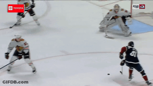 Hockey Game In Front Of Toyota Banner GIF
