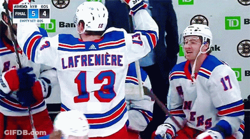 Hockey Game In Front Of Toyota Sign GIF