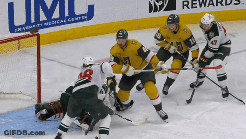 Hockey Game In Front Of University Medical Center Sign GIF