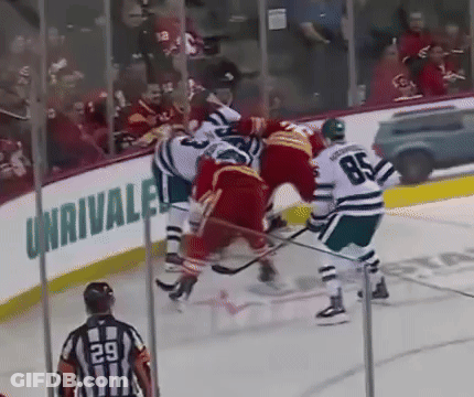 Hockey Game In Front Of Unrivaled Sign GIF