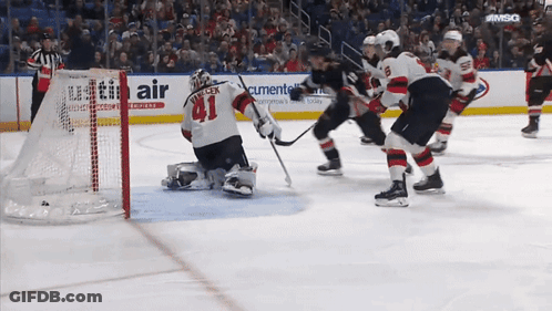 Hockey Game In Front Of Utility Air Ad GIF