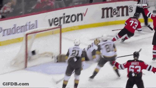 Hockey Game In Front Of Verizon Ad GIF