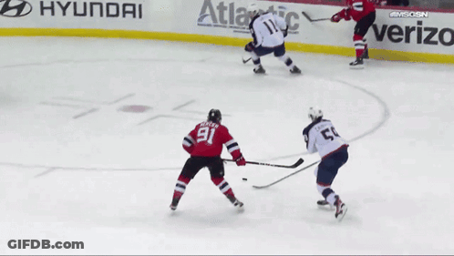 Hockey Game In Front Of Verizon Ad GIF