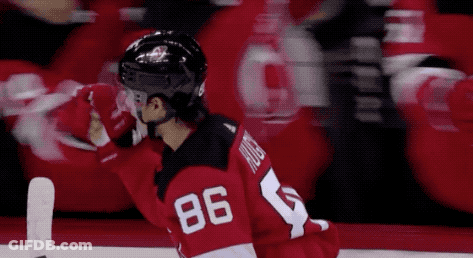 Hockey Game In Front Of Verizon Advertisement GIF