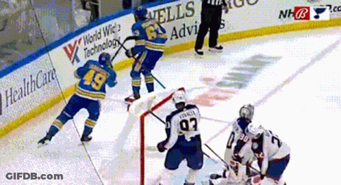 Hockey Game In Front Of Wells Advis Ad GIF