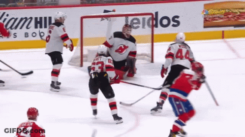 Hockey Game In Front Of William Hill Ad GIF