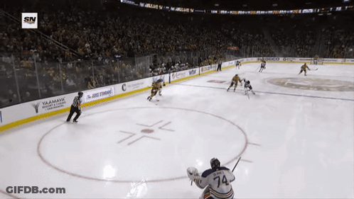 Hockey Game In Stadium Sponsored By Yamaha And Geico GIF