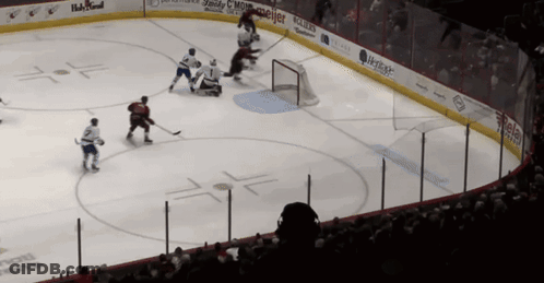 Hockey Game In Stadium With Ice Ads GIF