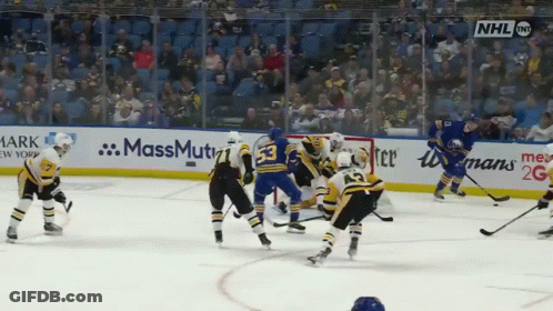 Hockey Game In Stadium With MassMutual Ads GIF