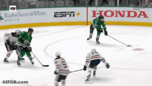 Hockey Game On Ice Rink With Honda ESPN And Baylor Scott & White Ads GIF