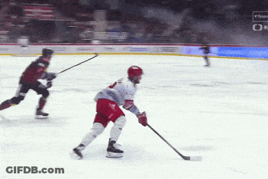 Hockey Game On Rink With Bauer Sign GIF