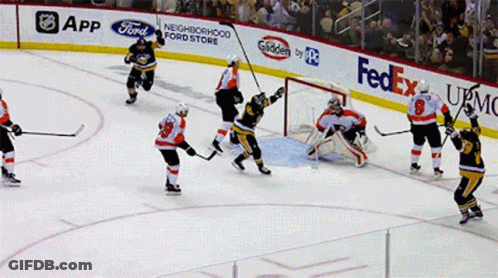 Hockey Game On Rink With FedEx Ads GIF