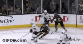 Hockey Game On Rink With Litone Advertisements GIF