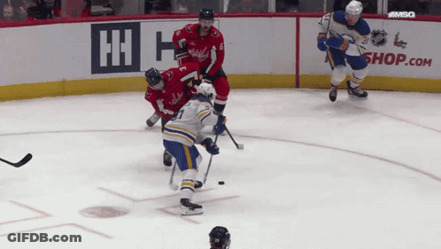 Hockey Game On Rink With Shop.com Ad GIF
