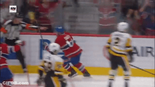 Hockey Game Played In Front Of Air Banner GIF