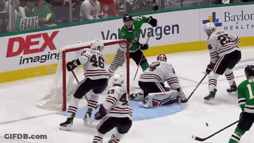 Hockey Game Played In Front Of Dex Imaging Banner GIF