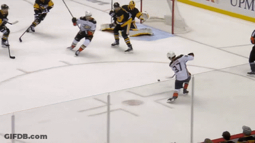 Hockey Game With FedEx Ad GIF
