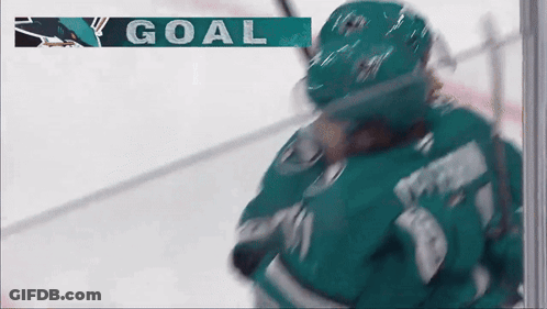Hockey Game With Goal Displayed On Screen GIF