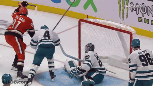 Hockey Game With Monster Energy Sign GIF