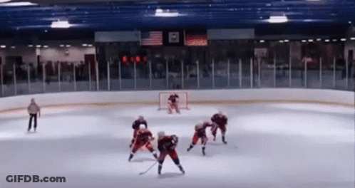 Hockey Game With Reebok Scoreboard GIF