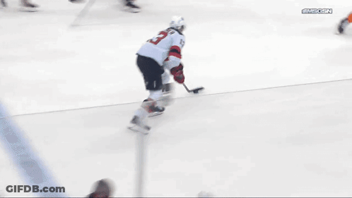 Hockey Goalie In Front Of RWJ Barnabas Health Sign GIF
