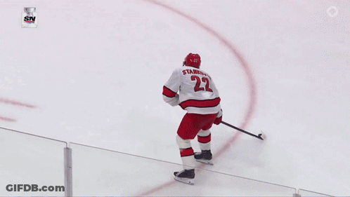Hockey Goalie Kneeling In Front Of Bauer Net GIF