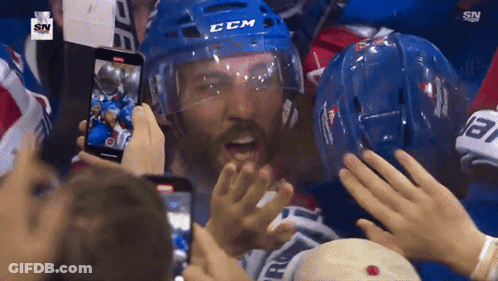 Hockey Goalie Kneeling In Front Of Coors Light Sign GIF