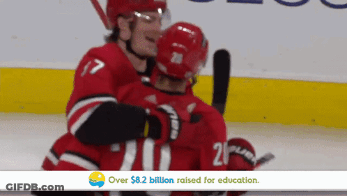Hockey Player 21 Hugging Another Player GIF