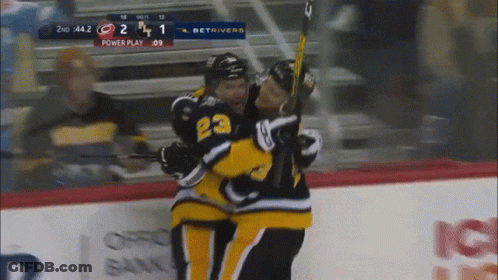 Hockey Player 22 Hugging Teammate GIF