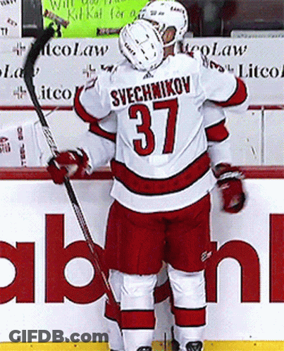 Hockey Player 37 Hugging Another Player GIF