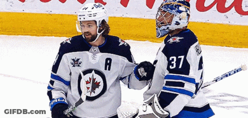 Hockey Player 37 Talking To Another Player GIF