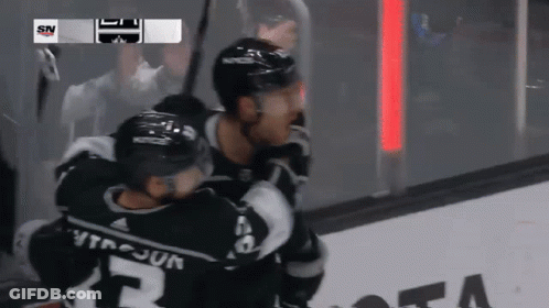 Hockey Player 42 Hugging Teammate GIF