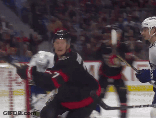 Hockey Player 61 Next To Referee GIF