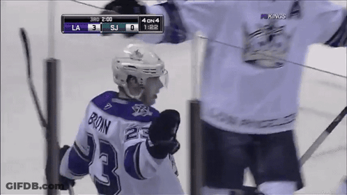 Hockey Player Brown On Jersey Standing On Ice GIF