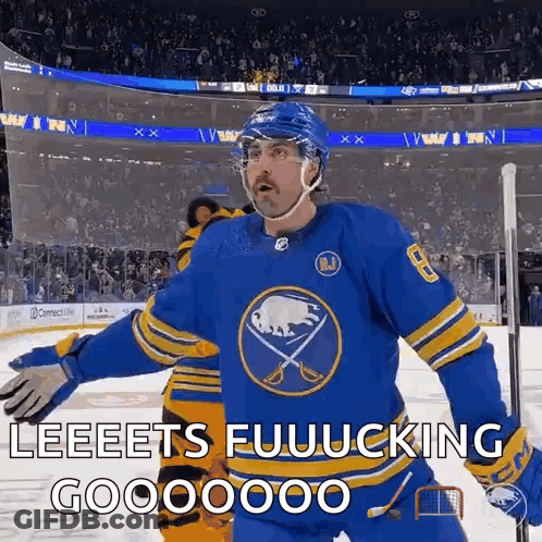 Hockey Player Celebrating On Ice GIF